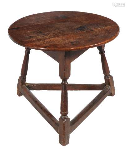 A William and Mary oak 'cricket' table, circa 1690