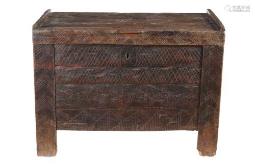 A Spanish walnut chest, incorporating 16th century and later elements