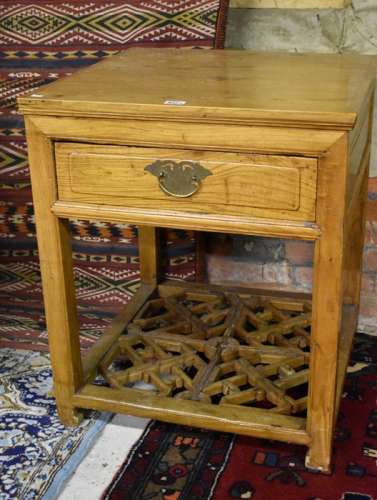 A Chinese elm square side table with frieze drawer, on square supports with lattice undertier
