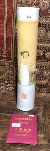 A contemporary, tall Chinese vase of cylindrical form, decorated with an elegant beauty beside a