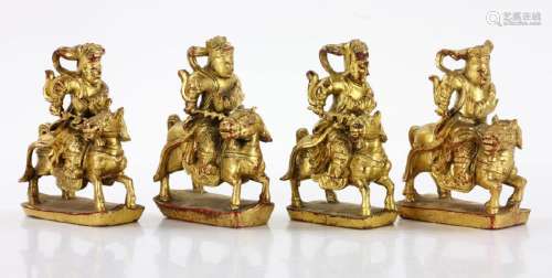 Four Carved Wood Figures on Horses