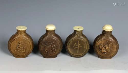 Set of Four Carved Gourd Snuff Bottles with Mark