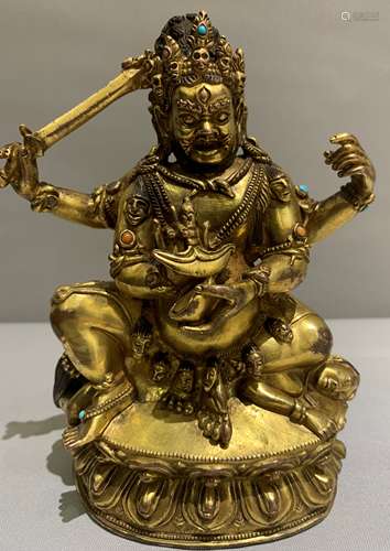 Sino-Tibetan Gilt Bronze Buddha Figure with Sword