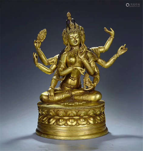 A EIGHT ARMS SITTING BODHISATTVA GILT BRONZE STATUE