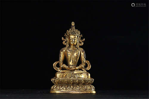 A GILT BRONZE SITTING BUDDHA STATUE