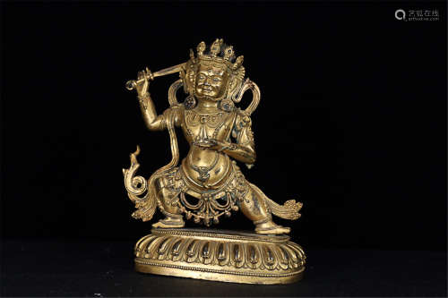 A TIBETAN GILT BRONZE BUDDHA DESIGN FIGURE