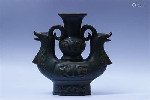 A LONGQUAN KILN BEAST PATTERN DOUBLE-EAR BOTTLE