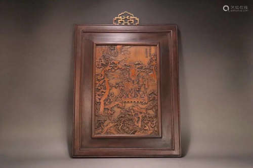 A RED WOOD CARVED HANGING SCREEN