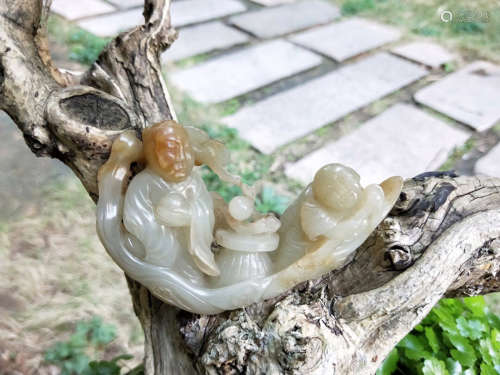 A HETIAN JADE CARVED FIGURE AND SHIP SHAPED PENDANT