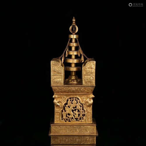 A GILT BRONZE TOWER SHAPED BUDDHIST CONTAINER