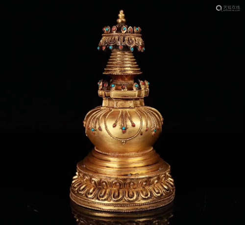 A TIBETAN GILT- BRONZE RITUAL TOWER