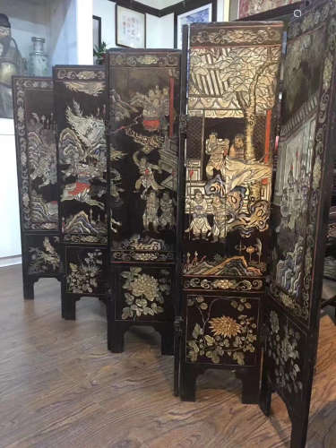 A LACQUER WOOD CARVED CHARACTER STORY PATTERN SCREEN