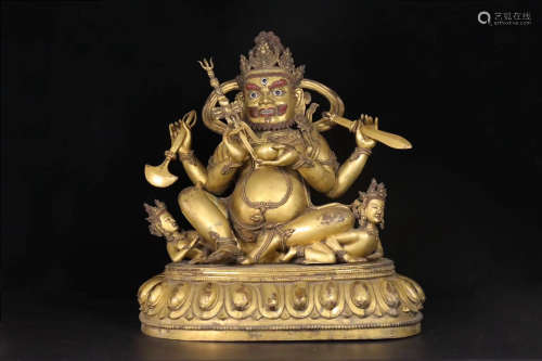 A GILT BRONZE TIBETAN BUDDHA STATUE