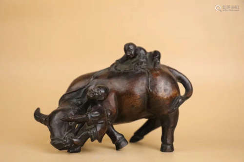 A COW SHAPED CHENXIANG WOOD CARVING