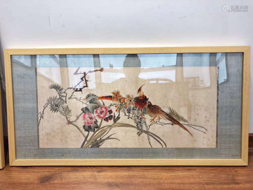 A BIRD AND FLORAL PATTERN EMBROIDERY