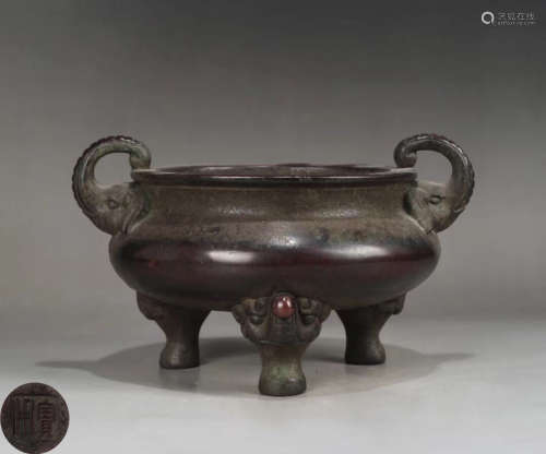 A BRONZE CASTED TRIPOD CENSER