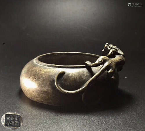 A BRONZE CASTED DRAGON SHAPED WATER BOWL