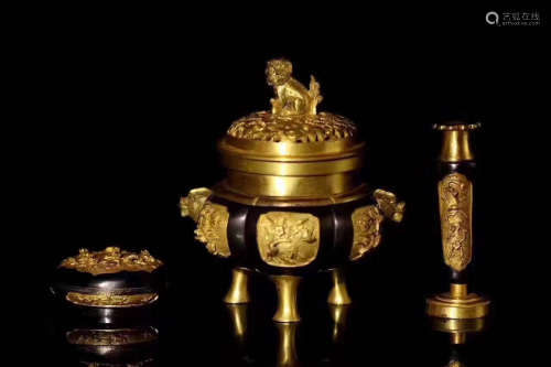 SET OF GILT BRONZE MOLDED BUDDHIST UTENSILS