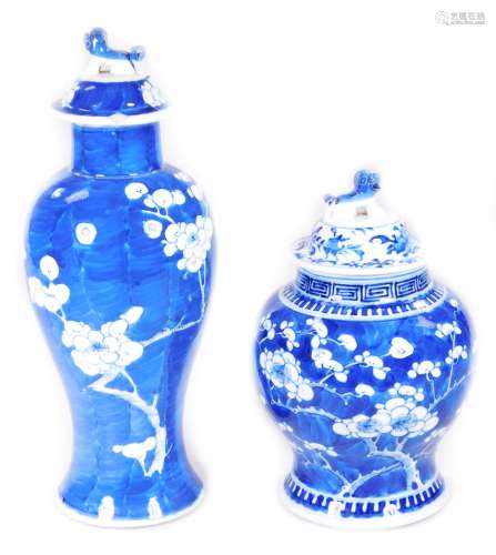 A Chinese Qing period blue and white porcelain prunus vase, of inverted shouldered outline, on a