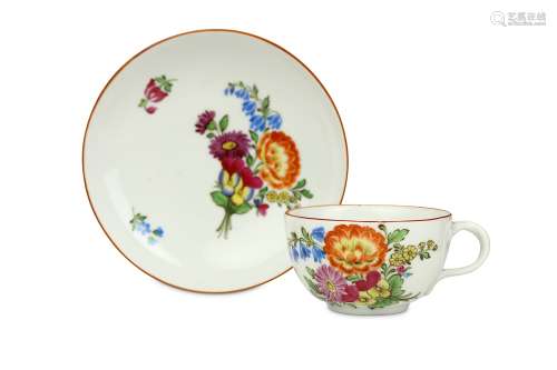 AN IMPERIAL RUSSIAN PORCELAIN CUP AND SAUCER BY THE POPOV MANUFACTORY