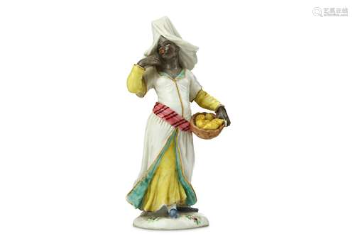 A PARIS PORCELAIN MOORISH FIGURE OF A LEMON SELLER