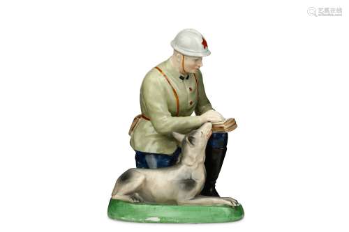 A SOVIET RUSSIAN PORCELAIN PROPAGANDA FIGURE OF A RED ARMY SOLDIER