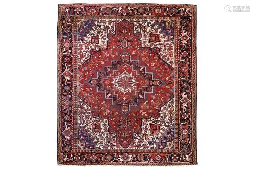A HERIZ CARPET, NORTH-WEST PERSIA approx: 9ft. x 7ft.8in.(274cm. x 234cm.) Good colour combination