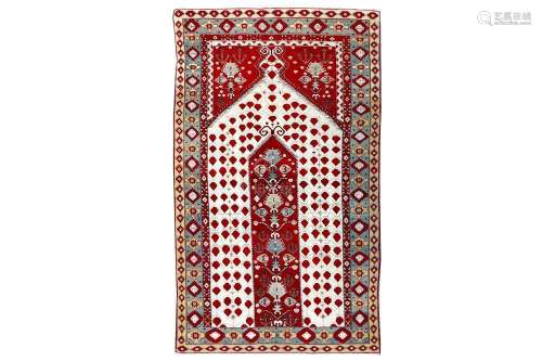 A FINE ANTIQUE AGRA PRAYER RUG, NORTH INDIA approx: 6ft.10in. x 4ft.1in.(208cm. x 124cm.) Rather