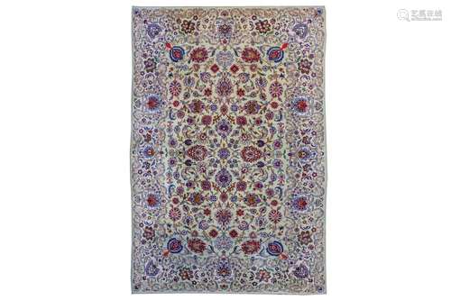 A FINE KASHAN CARPET, CENTRAL PERSIA The shaded light beige field with overall design of various