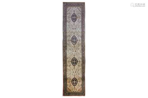 A VERY FINE SILK QUM RUNNER, CENTRAL PERSIA approx: 12ft.2in. x 2ft.11in.(370cm. x 89cm.) Very