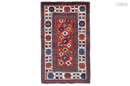 AN ANTIQUE KAZAK RUG, SOUTH CAUCASUS approx: 7ft.7in. x 4ft.6in.(231cm. x 137cm.) Very good