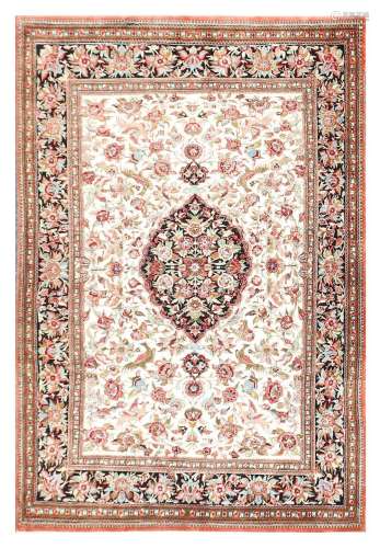 AN EXTREMELY FINE SILK QUM RUG, CENTRAL PERSIA approx: 5ft.5in. x 3ft.7in.(165cm. x 109cm.)