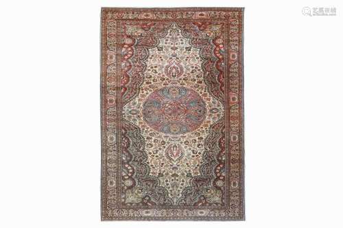 A FINE ANATOLIAN CARPET, TURKEY approx: 9ft.11in. x 6ft.8in.(302cm. x 204cm.) The ivory field with