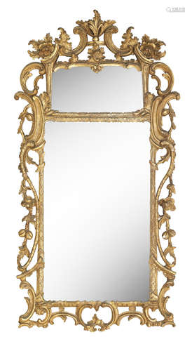 A George III giltwood and gesso wall mirror in the rococo style