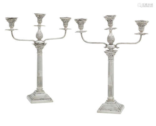 by Rosenzweig, Taitelbaum & Co, London 1904  A pair of silver three branch candelabra