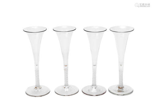 Circa 1750-70 A set of four opaque twist wine flutes and three other glasses