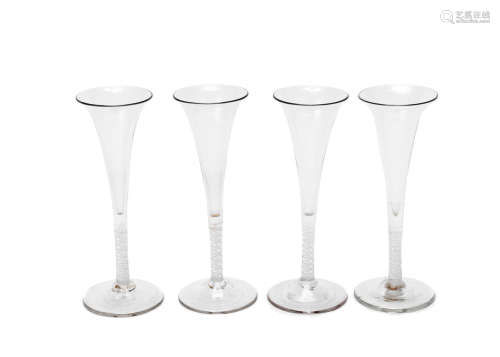 Circa 1750-70 A set of four opaque twist wine flutes and three other glasses