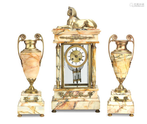 The movement stamped Samuel Marti  3 A late 19th/early 20th century Egyptian revival clock garniture