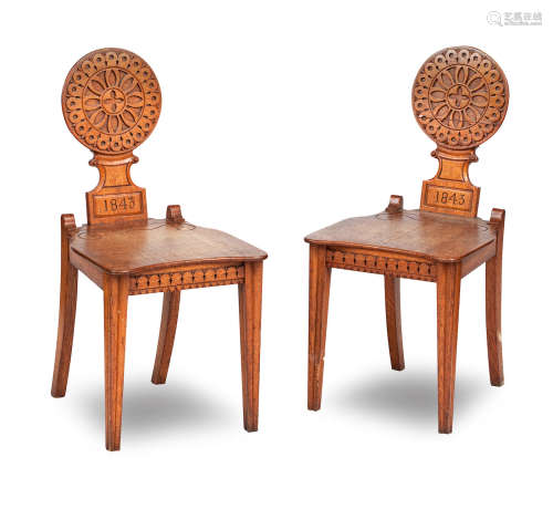 A pair of 19th century oak hall chairs