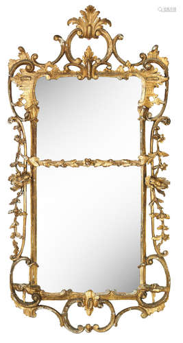 A 19th century carved giltwood and gesso mirror in the rococo style