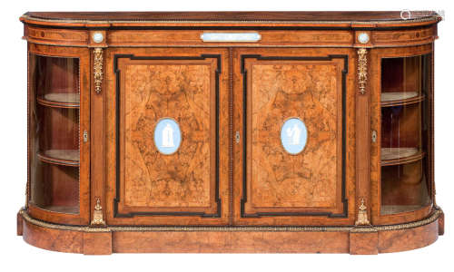 A 19th Century walnut, rosewood and porcelain mounted credenza