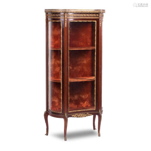 A late 19th century mahogany and gilt metal mounted vitrine cabinet