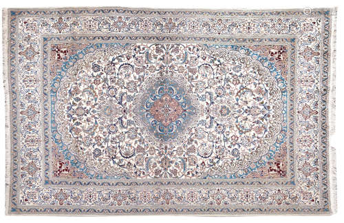 240cms x 350cms A central persian carpet