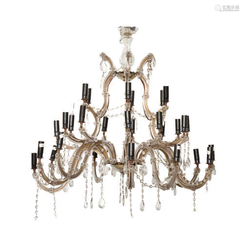 A mid-20th century gilt metal and moulded glass chandelier