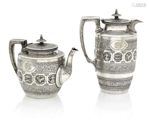 by James Reid, Glasgow 1883, retailed by Sorley Bros.,  (2) A Victorian silver 'Zodiac pattern' teapot and hot water pot