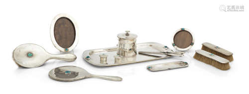 London, various dates, 1908-1915  (12) Liberty & Co, a twelve piece silver and turquoise mounted dressing table set