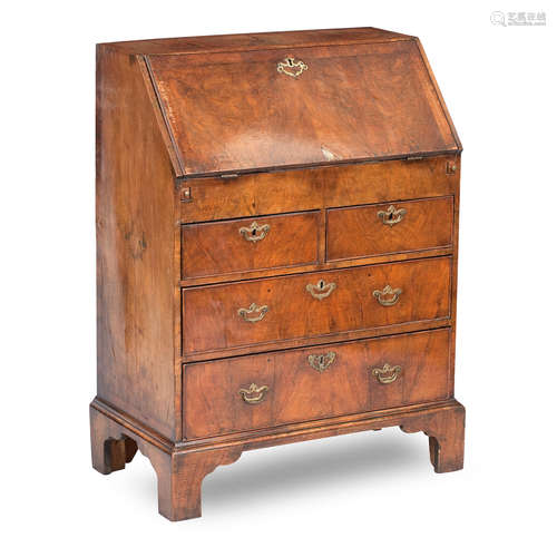 A George II crossbanded walnut bureau