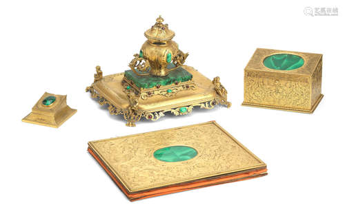 A late 19th century engraved gilt bronze, malachite and red glass stone inset desk stand