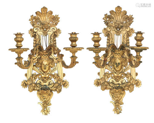 A set of four late 19th century ormolu wall appliques