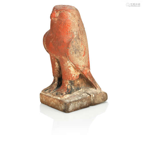 An Egyptian wood Horus falcon, Late Period, circa 664-332 B.C.
